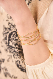 BRAZALETE RÍGIDO PIEDRAS - GOLDEN