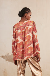 BLUSA OVERSIZE MANGA LARGA ESTAMPADA CON BORDADOS - NUDE