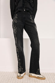 JEANS SLIM BOOT CUT TACHUELAS - NEGRO