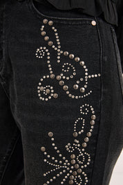JEANS SLIM BOOT CUT TACHUELAS - NEGRO
