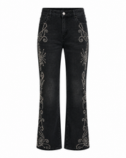 JEANS SLIM BOOT CUT TACHUELAS - NEGRO