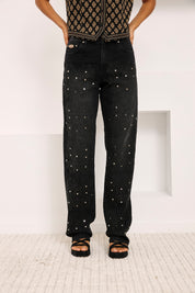 JEANS TACHUELAS ALL OVER - NEGRO