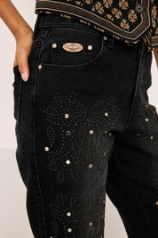 JEANS TACHUELAS ALL OVER - NEGRO