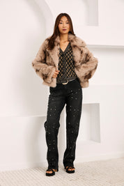JEANS TACHUELAS ALL OVER - NEGRO