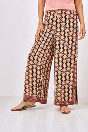 PANTALÓN FLUIDO ESTAMPADO - NEGRO