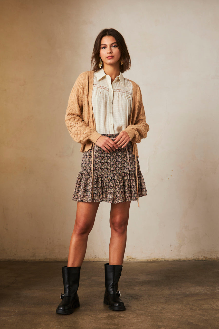PRINTED SHORT SKIRT WITH RUFFLE HEM - BLACK