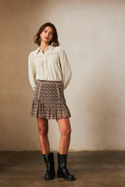 PRINTED SHORT SKIRT WITH RUFFLE HEM - BLACK