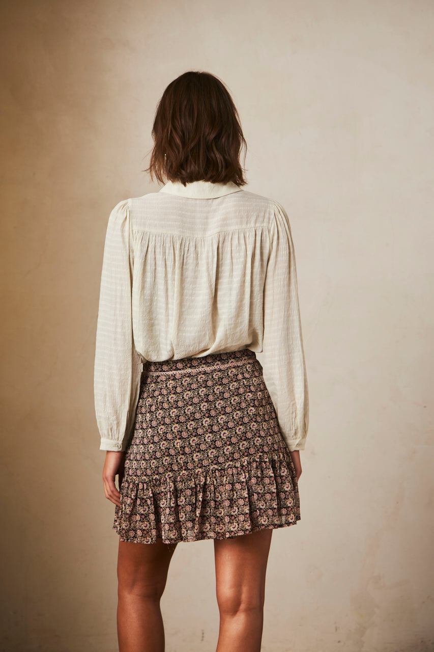 PRINTED SHORT SKIRT WITH RUFFLE HEM - BLACK