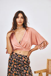 FRINGED KNIT WRAP BLOUSE - CORAL