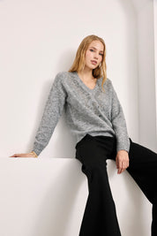 FLARED KNIT TROUSERS WITH POCKETS - BLACK