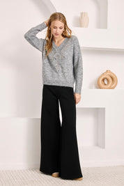 FLARED KNIT TROUSERS WITH POCKETS - BLACK