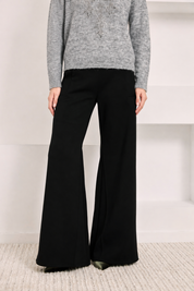 FLARED KNIT TROUSERS WITH POCKETS - BLACK