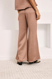 PANTALÓN FLUIDO BOOT CUT - TAUPE
