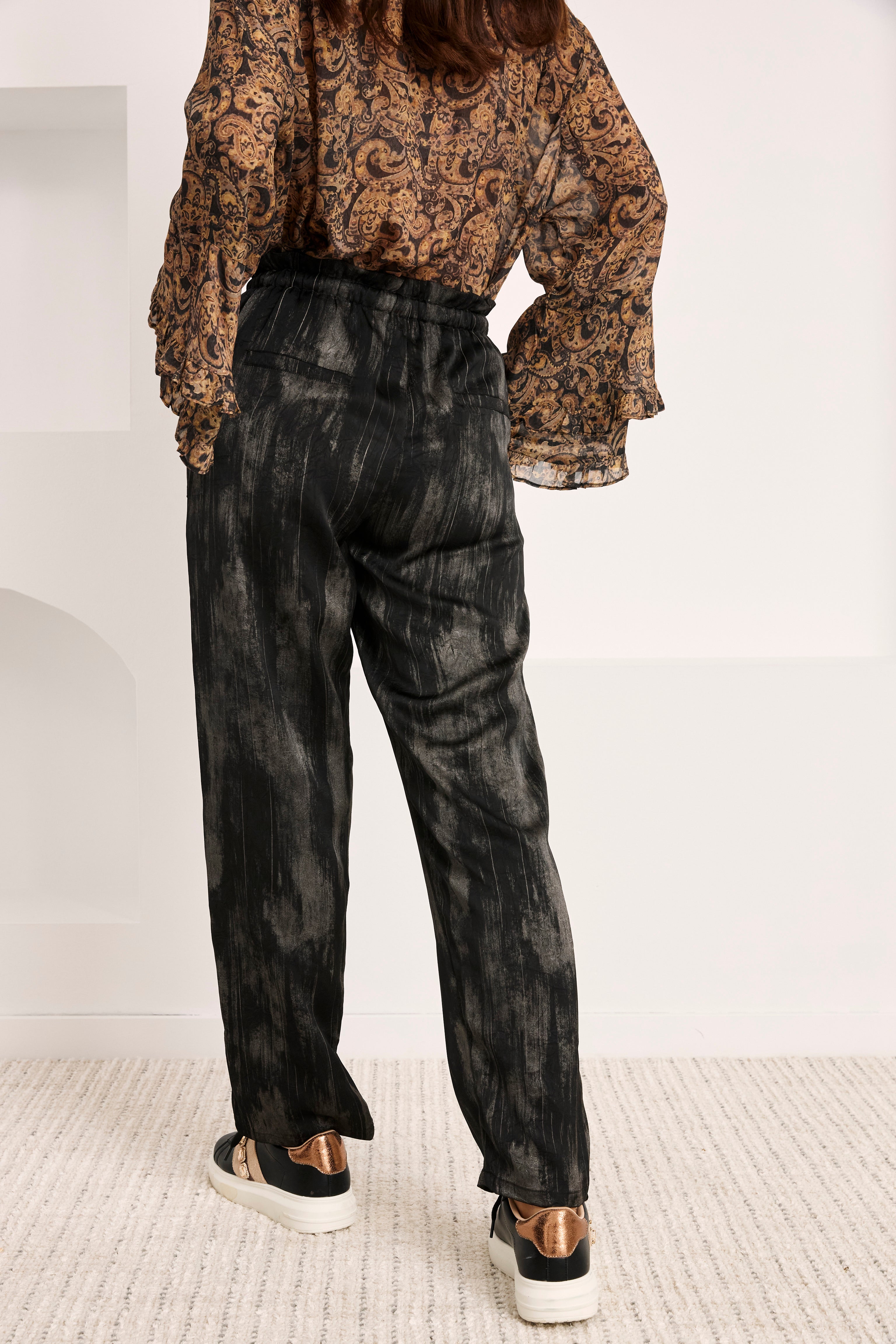 PANTALÓN LAZADA TACHUELAS - NEGRO