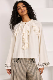 BLUSA VOLANTES PUÑOS JOYA - IVORY