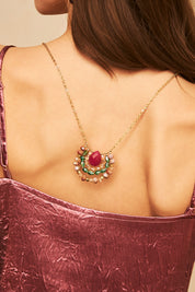LONG NECKLACE WITH CENTRAL FLOWER IN STONES - MAGENTA