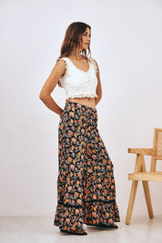 PRINTED FLOWY TROUSERS WITH LACE AND RUFFLES - BLACK