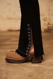Studded denim pants with slit at the hem - Black