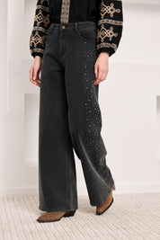 JEANS TACHUELAS LATERALES - NEGRO