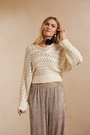 JERSEY CROPED MANGA LARGA CON CALADOS - IVORY